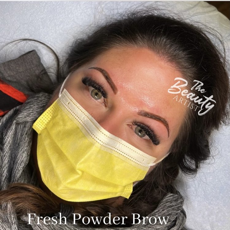 Photo of a fresh powder brow on a woman