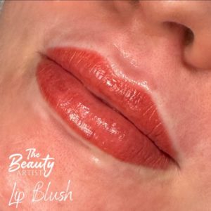 Lips featuring cosmetically tattooed color